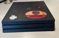 PS4 pro with 2 controllers and 30 games 