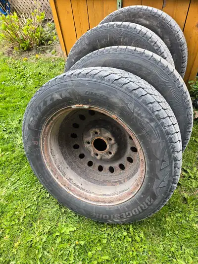 Winter Tires. Bridgestone. 225/65/17. 5 Bolt Rims. Off Dodge Caravan. Used 2 Winters.