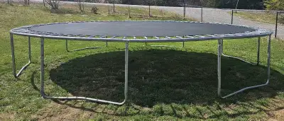 17 foot trampoline with uprights but needs new mesh. Some of the padding has wore off the uprights b...