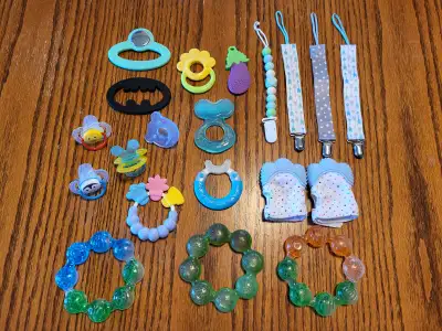 Baby teethers, bib clips, teething mitten, pacifiers- USED LIKE, View more