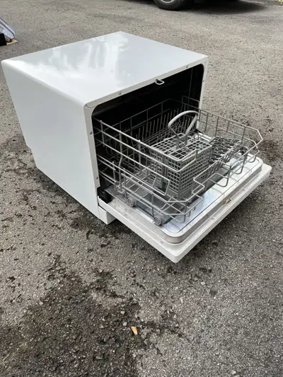 Working Danby Dishwasher. Still works and I just recently cleaned it! Would be willing to negotiate...