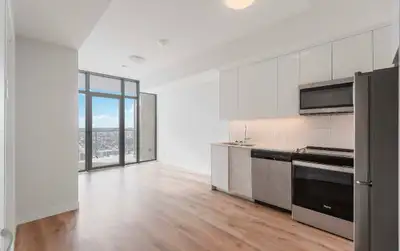 1 Bed + Den Condo w/ Parking in DTK