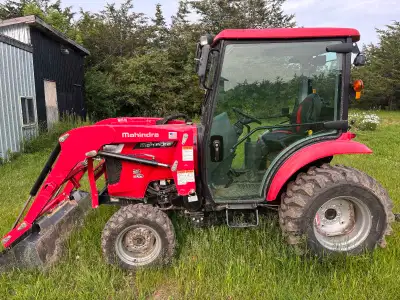 I am selling a 2021 Mahindra 1635 front end loader, a robust machine designed for a variety of tasks...