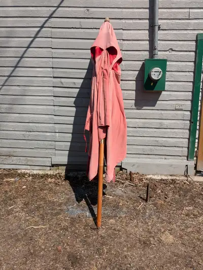 Please read the Ad Pick up in Westmeath Red umbrella, heavy duty Red in colour but faded. It comes a...