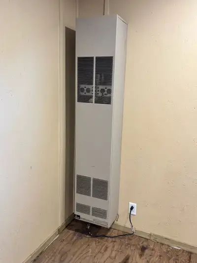 Empire DVC 35 1 SPP direct vent standing propane furnace. Used to heat a 16’ x 24’ garage. Heats qui...