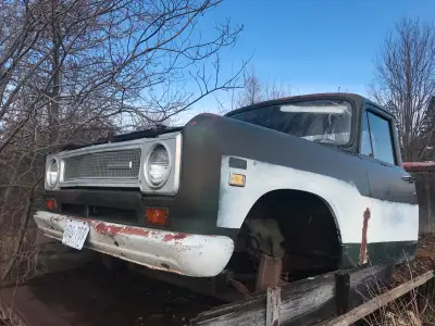 This is a used International Harvester truck cab and front end, perfect for restoration or parts. It...