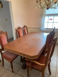 Solid wood dining table and hutch set. (6 chairs)