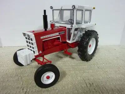 1/16th COCKSHUTT 1755 farm toy tractor produced by SpecCast in 2020. This is a heavy, well built die...