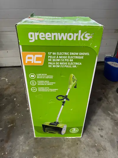 12 inch electric snow shovel. Brand new in box.