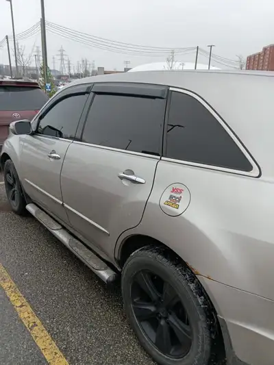 2010 Acura MDX for sale asking for $3500 obo comes with 2 sets of keys, remote starter, tinted windo...