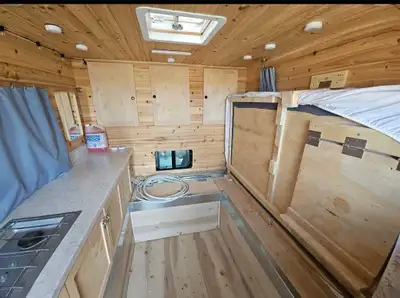 Weighs around 1000lbs. NO LEAKS. Propane stove, sink and propane heater. NO fridge. Jack's will fit...
