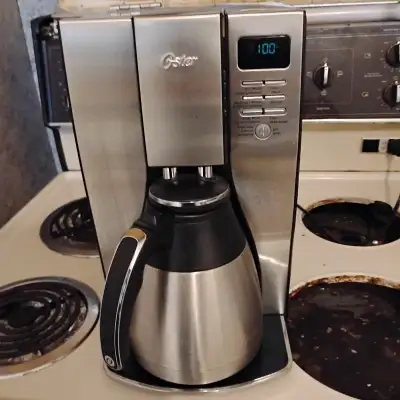 I HAVE FOR SALE AN OSTER COFFEE MAKER. IT IS ONE THOSE MORE EXPENSIVE MODELS. IT HAS STAINLESS STEEL...