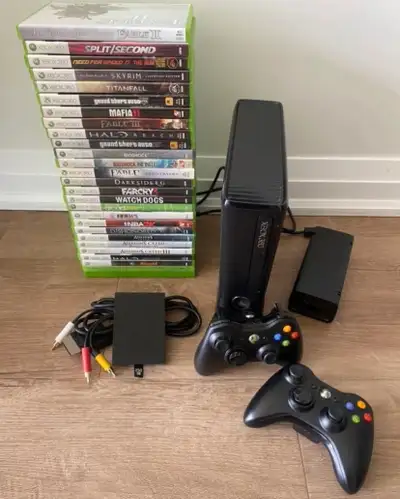 Xbox 360 Slim 4gb + 250gb HDD + 26 Games, View more