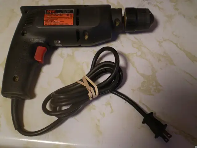 SKIL 3/8 VARIABLE SPEED REVERSIBLE 110 VOLT HAND DRILL65137374184066122
