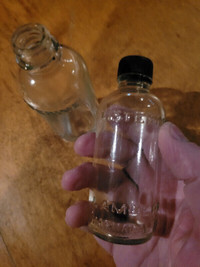 Vintage embossed Listerine bottle.