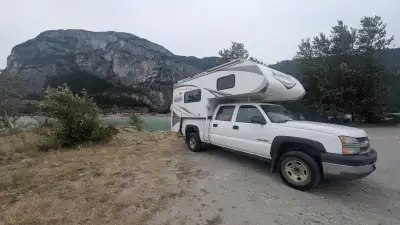Fully equipped truck camper setup ready for year-round off-grid living. Camper: 2016 Lance 825 Four-...
