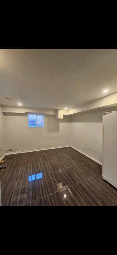 Room in basement seperate Entrance Unfurnished Close to shopping Schools And Major Hub No parking Av...