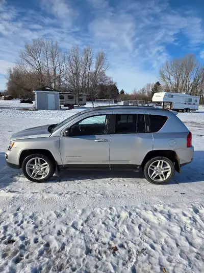 2012 Jeep Compass Ltd., navigation, sunroof, heated seats, hatch back, all wheel drive, new rear str...