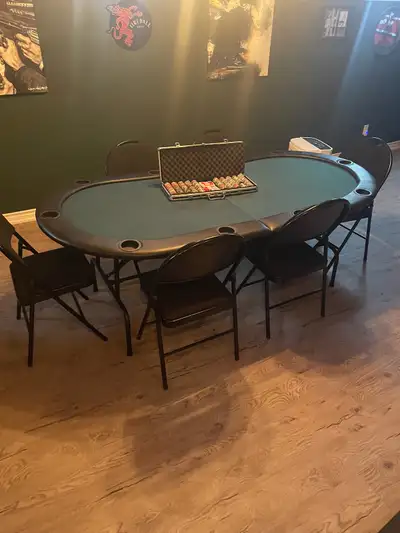 Beautiful poker table. Hardly used. Comes with full poker set and automatic card shuffler and 6 chai...