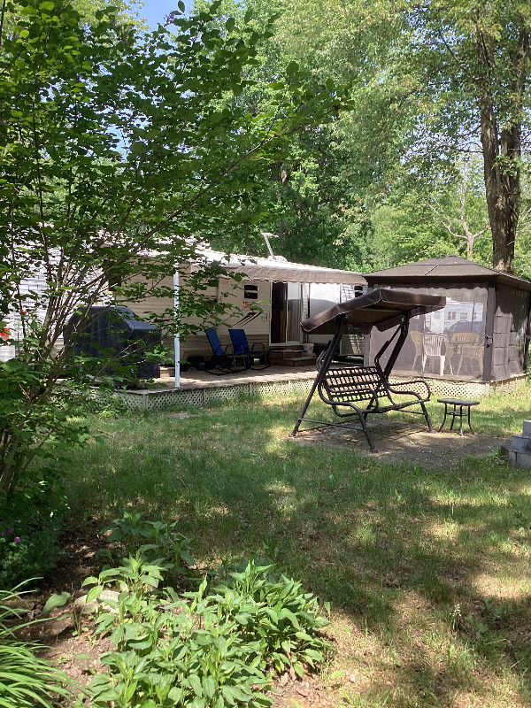 ROULOTTE À VENDRE SUR TERRAIN DE CAMPING Caravanes de parc Longueuil/Rive Sud Kijiji