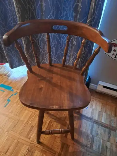 This is a sturdy wooden swivel chair that would be great for any room. As you can see from the photo...
