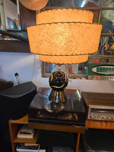 Illuminate your space with this unique vintage three-tier atomic spaghetti lamp, a true statement pi...