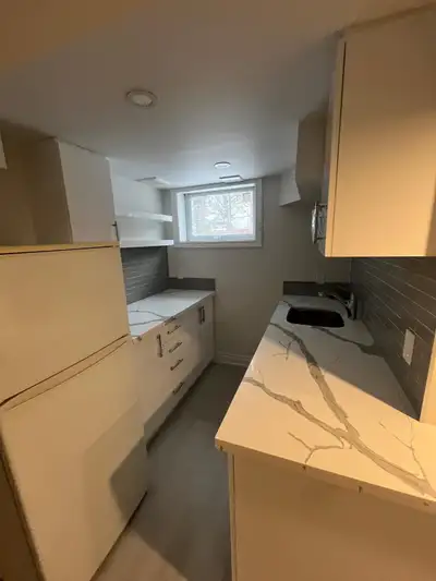 Welcome to your new cozy abode! This basement apartment features a functional kitchen, comfortable l...