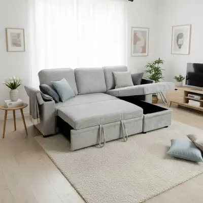 This versatile sectional sofa is in brand new condition, featuring a pull-out bed and ample storage,...