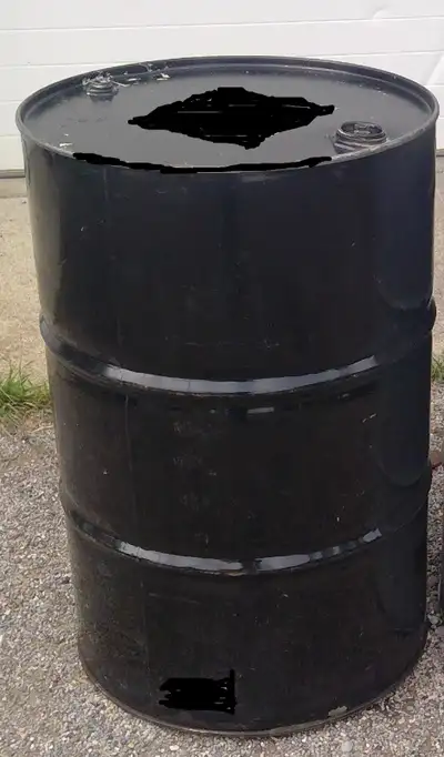 45 gallon steel barrels 23 inches across X 33 inches tall Clean can use for several things stove, bu...