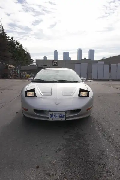 1995 Pontiac Firebird Base Model V6 3.4L engine, automatic transmission. Great for the look, not gas...