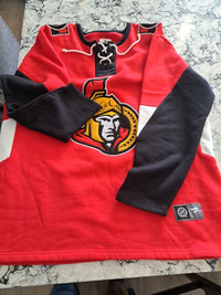 2 xl Ottawa Senators heavy flannel hockey sweater.