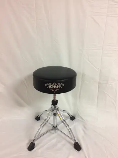 This is a Tama First Seat Custom Drum Throne with and XL Round Seat and a HSB4N Quartet Base . Retai...