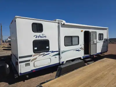 Almost looks new! Lightly used bumper pull RV trailer. Works great, pulls easy with 1500 truck. Larg...
