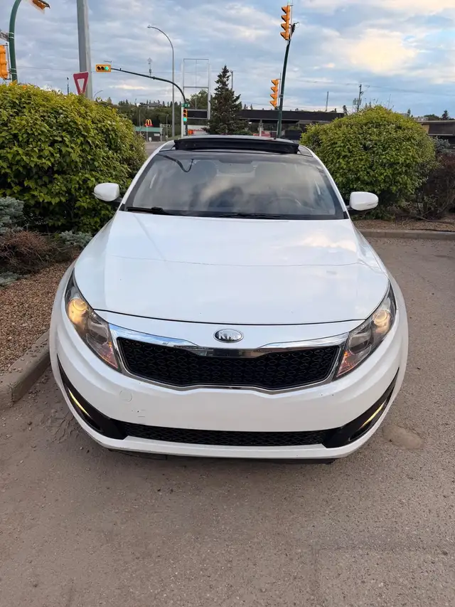 2013 Kia Optima only 102000