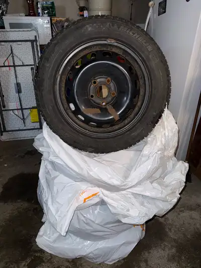 Selling a set of 4 Michelin winter tires mounted on rims, size 215/55/R16. (rims are 5x112) They wer...
