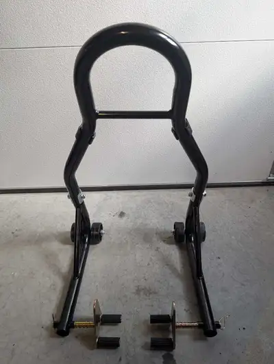This motorcycle stand is perfect for basic maintenance and storage. It is in very good condition, re...