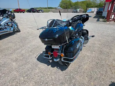 2003 Yamaha Midnight Venture black with blue flames. 1300cc. 101400km. In very good shape fully serv...