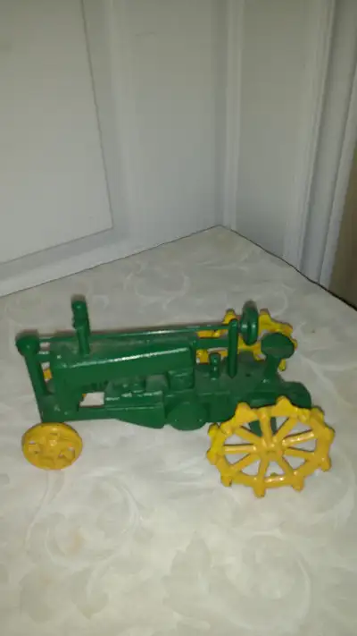 cast iron tractor, great for collectors, excellent condition, great for display cabinet, check out o...