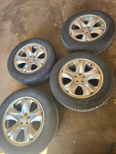 225/60r 17 Michelin Cross Climate tires on Subaru 5x100 rims. Excellent all weather tires. 2 have 80...