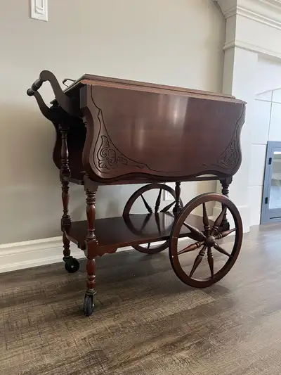 Limited Edition! Discover the charm of a bygone era with this Antique Walnut Wagon Wheel Drop Leaf T...