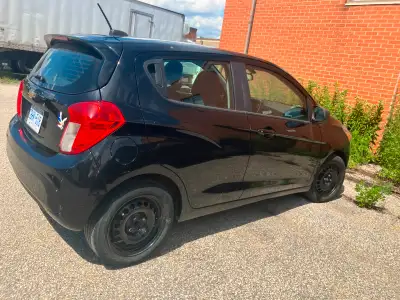 2017 Chevy Spark $5,000 133 km Runs Good No rust Has a strange noise underneath when hitting a bump....