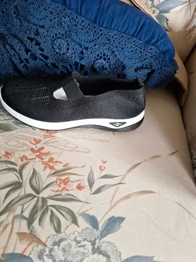 Sketchers woman's dress shoe size 10 and a half black in colour , View more