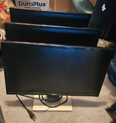 Three Dell monitors, View more