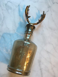 smoked gold glass decanter with antler style lid