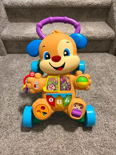 Fisher Price Laugh and Learn Baby walker and musical Learning toy. In excellent condition.