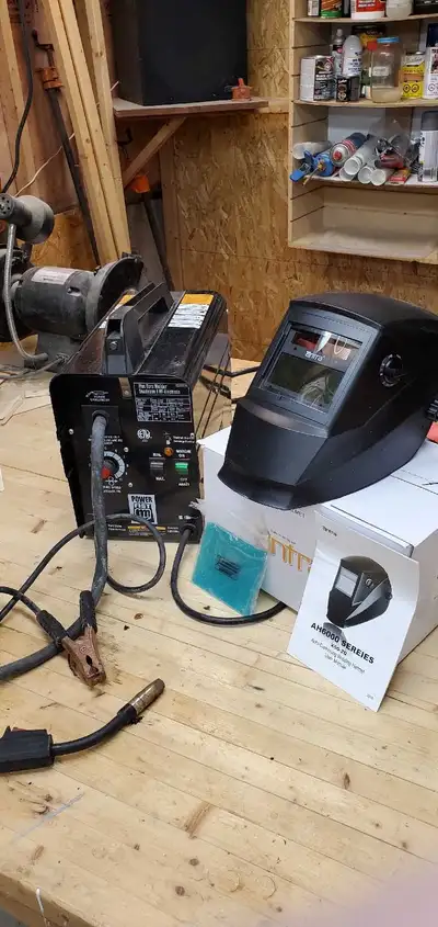 MIG Welder and brand new, never used  Helmet, View more