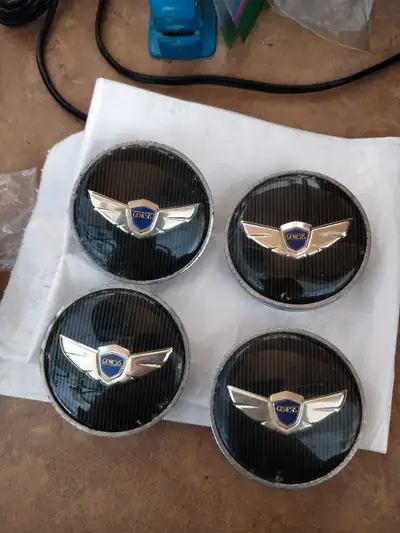 Selling x4 genesis coupe wing badge centercap Fits 18 and 19 OEM wheels
