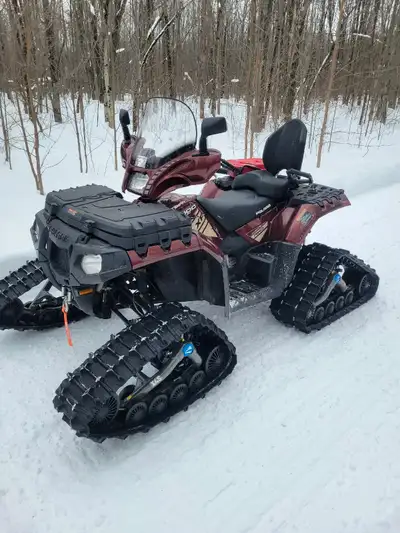 Polaris sportsman XP touring 1000. 2560 kms. Has heated grips. Matching windshield and winch. New ti...