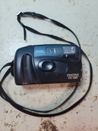 Vintage Pentax PC 100 35mm film Camera uses AA batteries. Good s