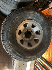 Yokohama Geolander winter tires on rims